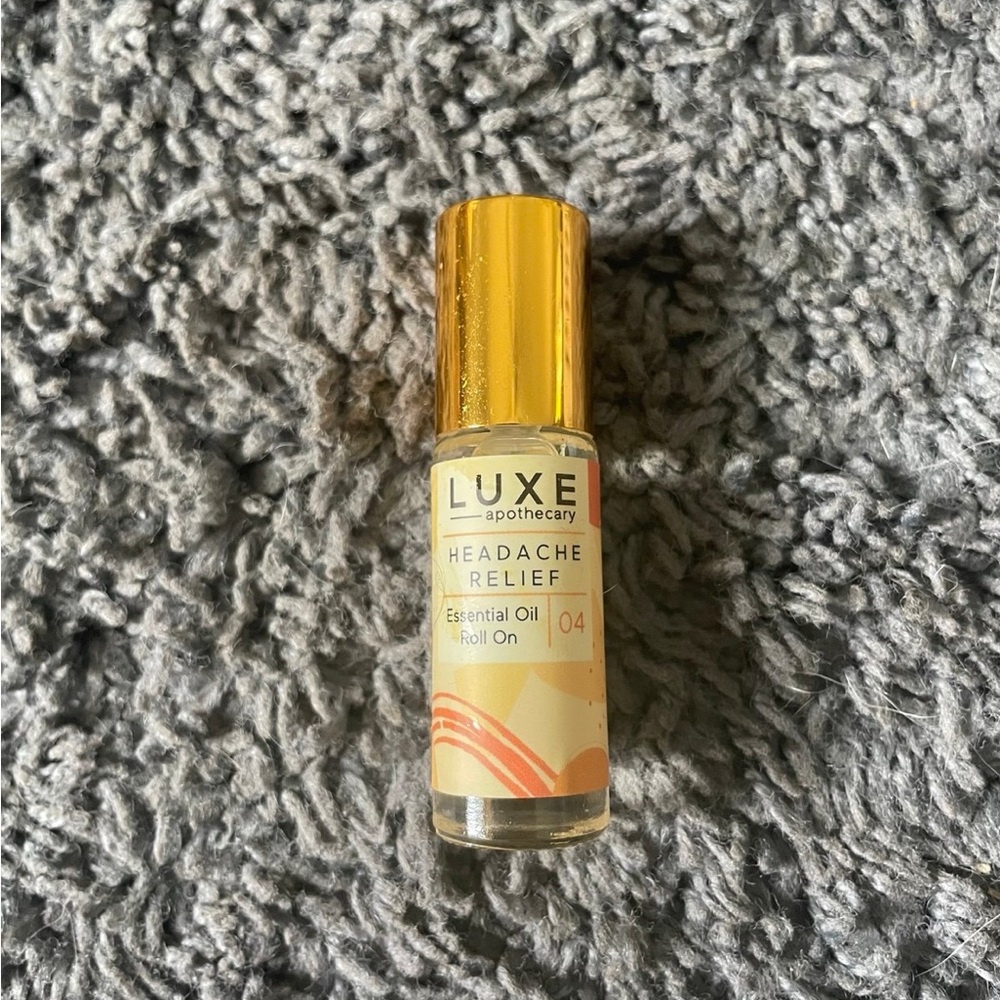 New with tags headache relief roll on essential oil